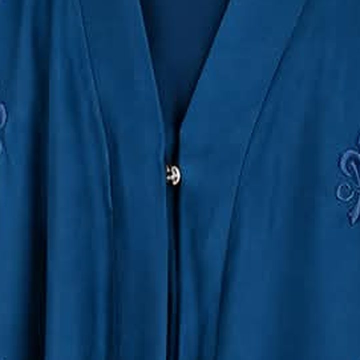 Front placket with button and fleur motifs