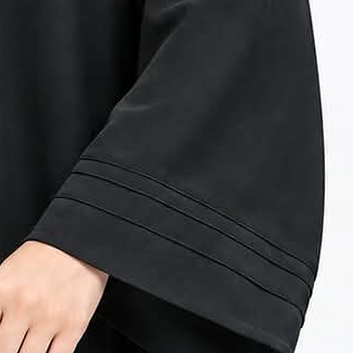 Triple pintucks above the cuff